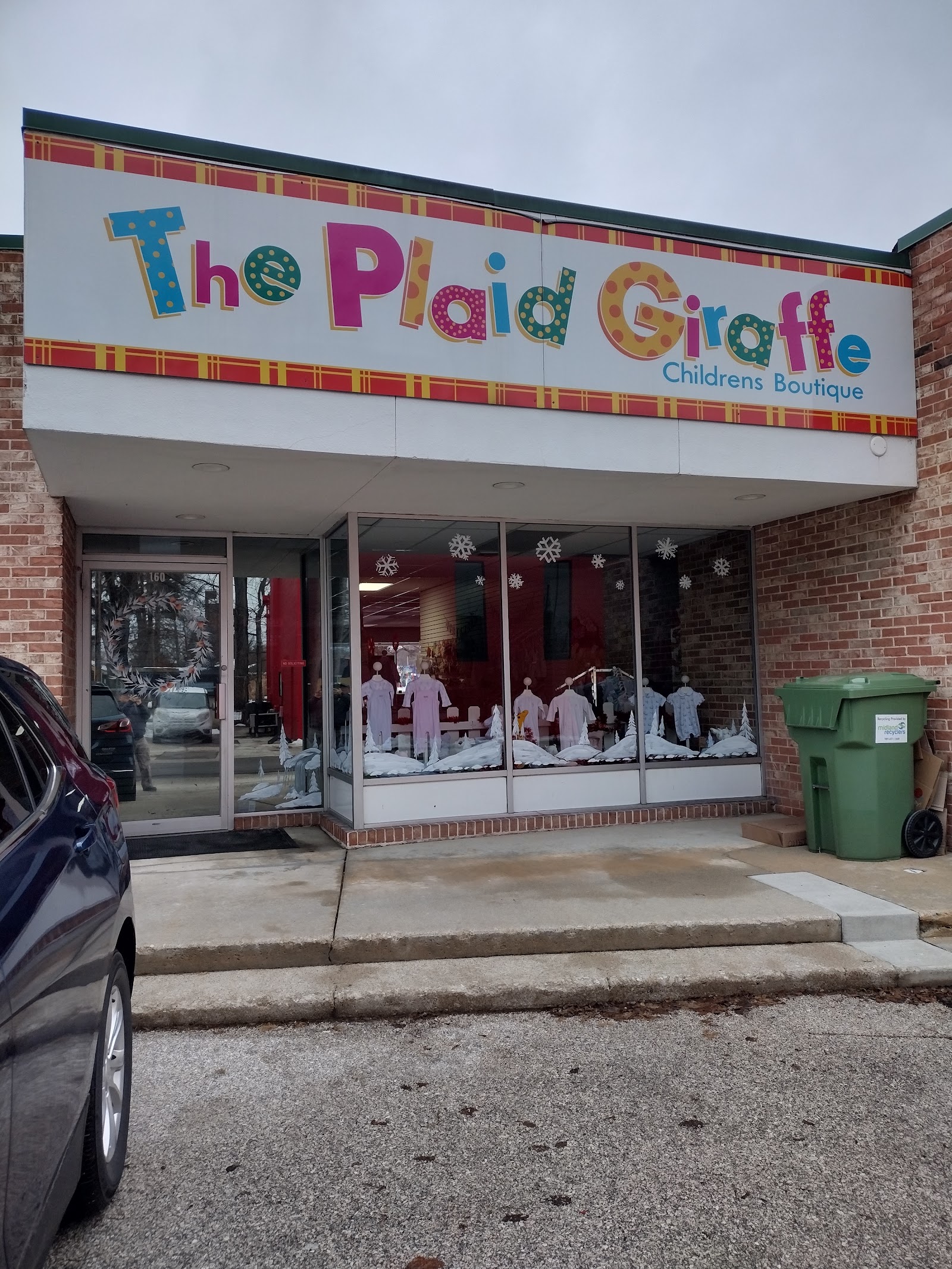 Plaid Giraffe Children's Boutique in Midland